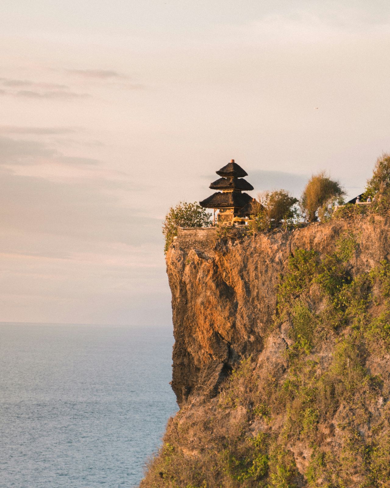 Uluwatu cliffs at golden hour, one of the best prewedding locations in Bali